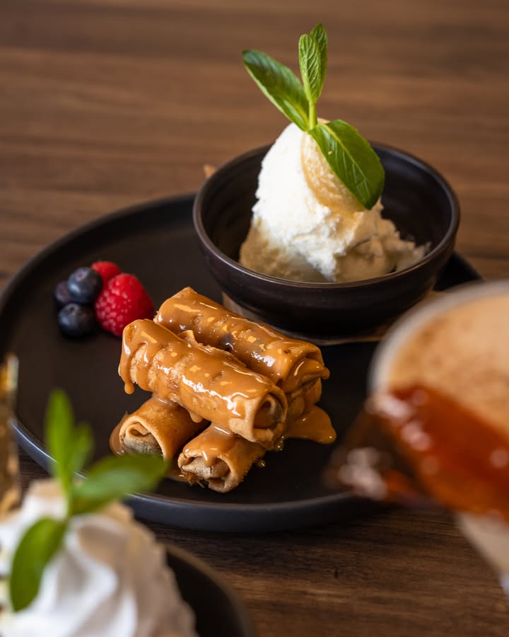 Featured image for “Apple Lumpia Delight: Indulge in Our Golden Crisp Dessert at Kitty’s Bar”